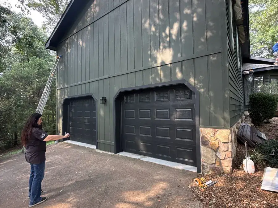 A Peaceful Painting crew member at work on an exterior in Chattanooga