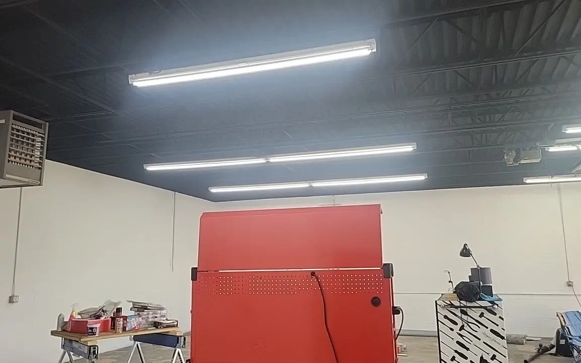 A commercial unit in Chattanooga with the exposed deck painted dark and the walls white