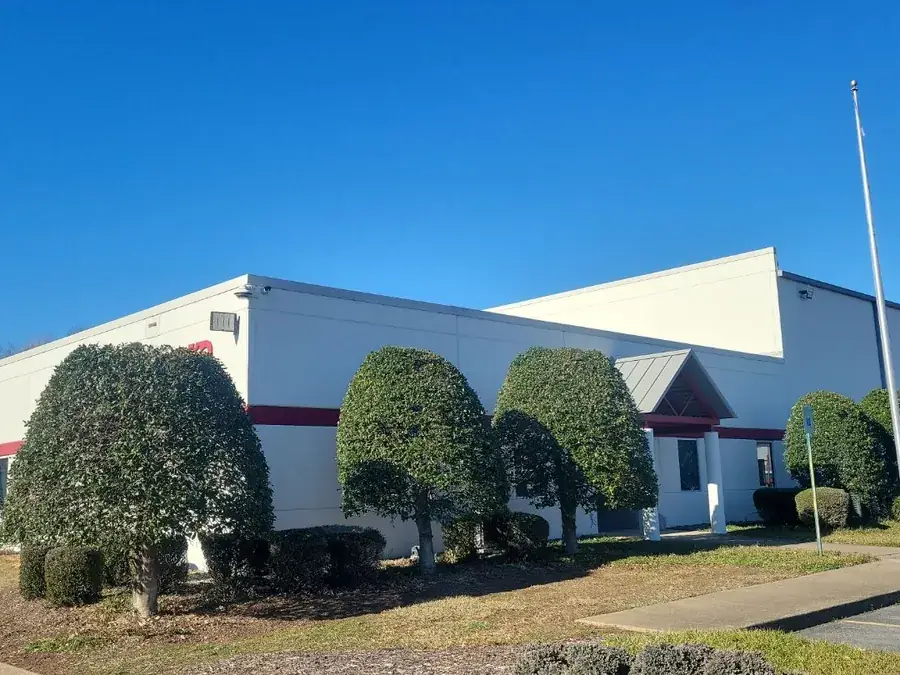 A repainted retail and commercial building exterior