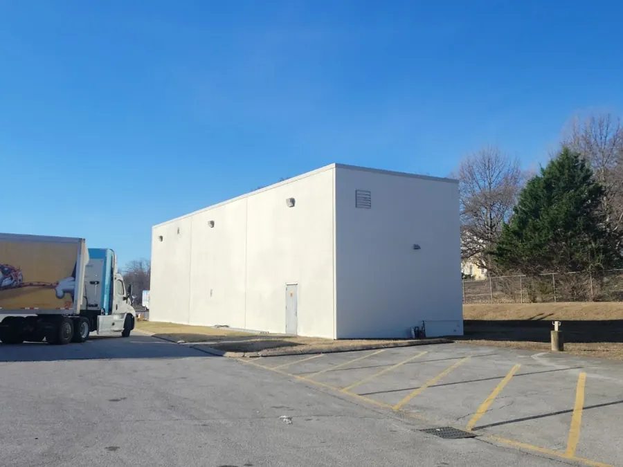 The same warehouse repainted in white