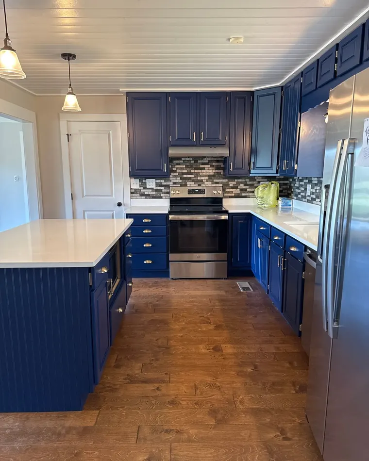 Kitchen in Signal Mountain, wood cabinets before and after refinishing in navy