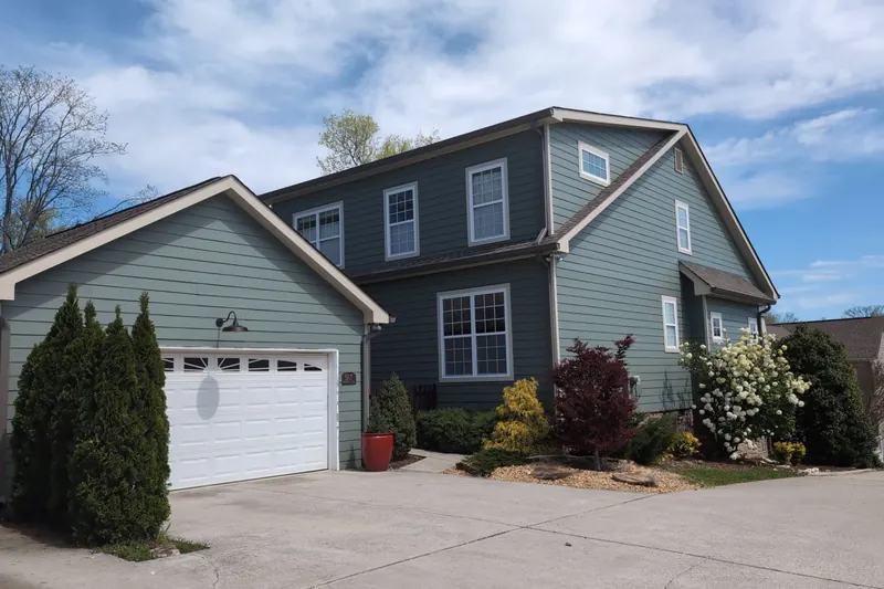 Repainted home exterior with white trim, Chattanooga